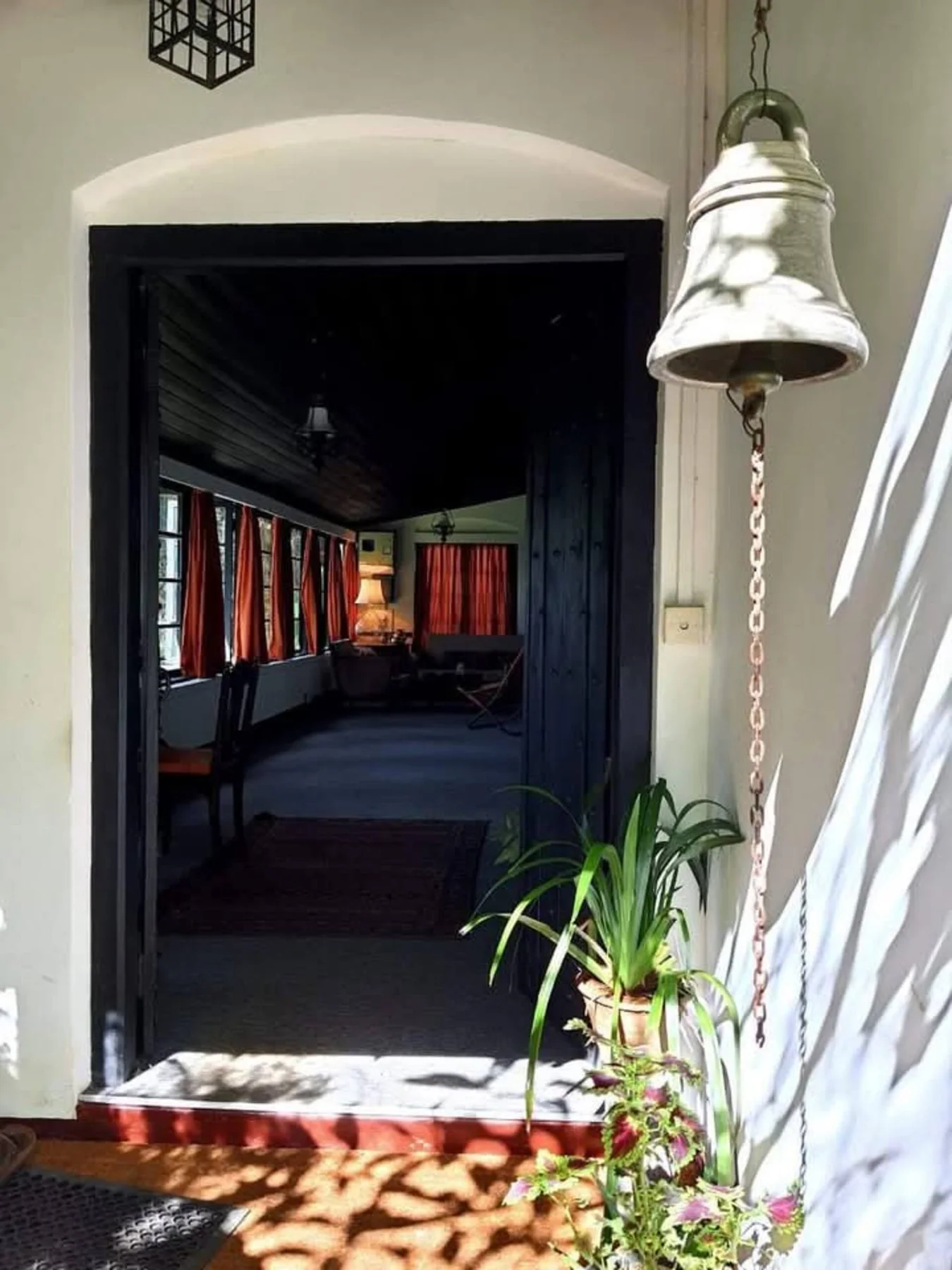 Sunlight at Selwood’s entrance bell and open door
